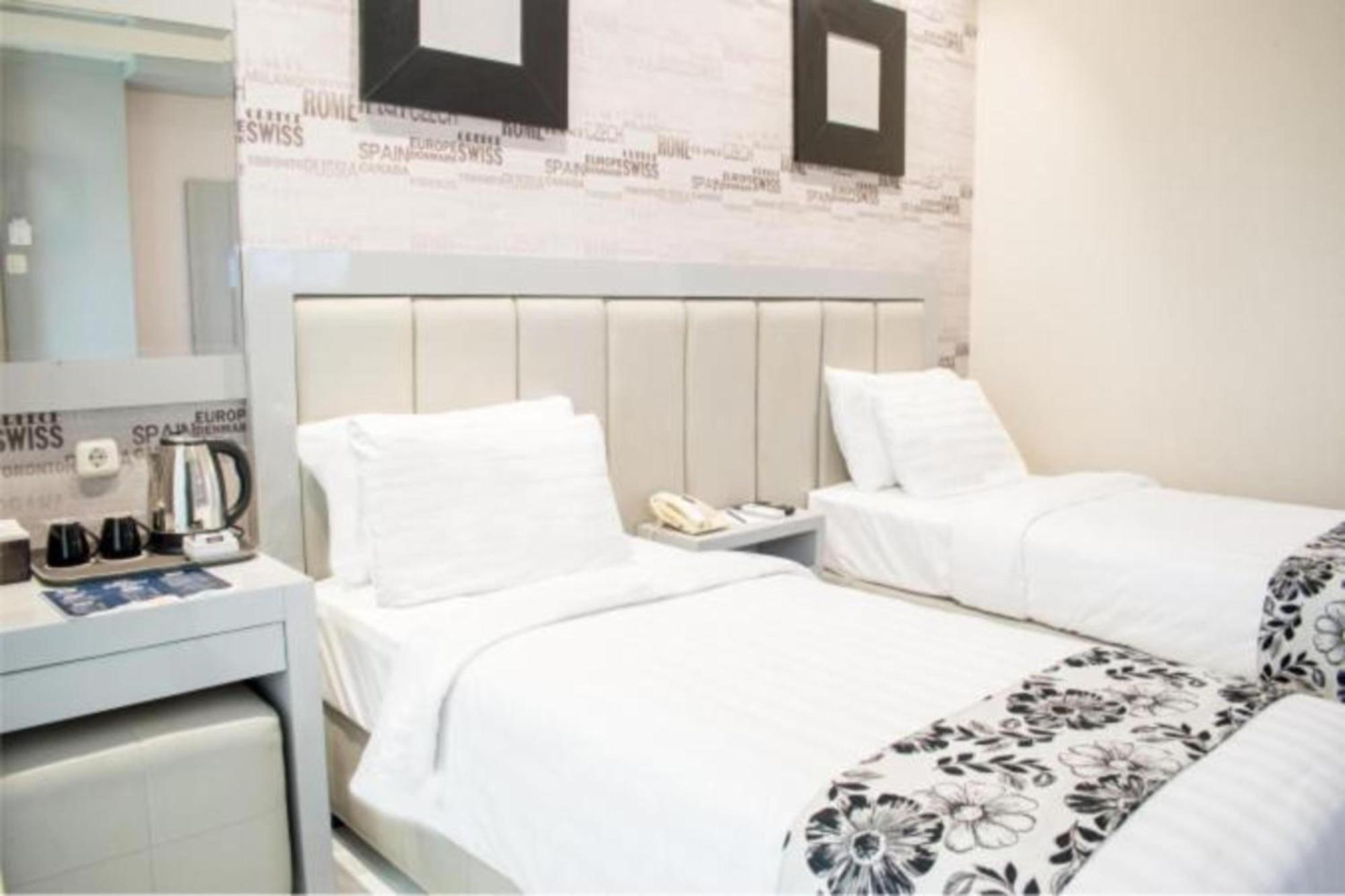 Luminor Hotel Jember By Wh Экстерьер фото
